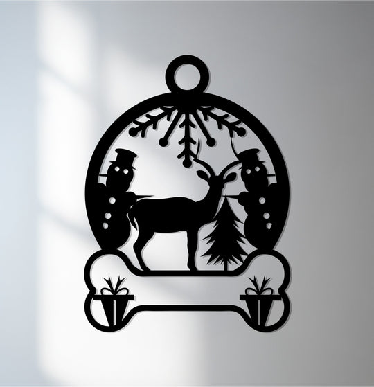 Black decorative metal art showcases a festive snowland scene with a reindeer, snowmen, and a Christmas tree within a circular frame.