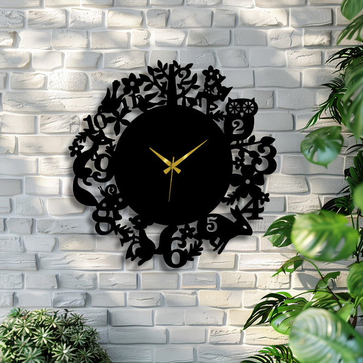 The decoration wall art woodland animals wall clock loudly displays its forest nature design, with elegant gold hands against a backdrop of brick.