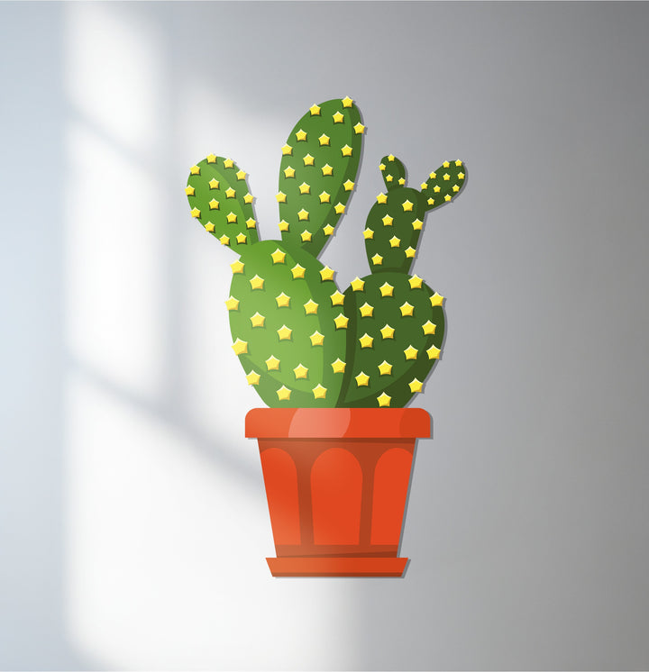 Vertical rectangle metal art for wall featuring a prickly pear cactus in a pot, displaying a modern desert botanical shape.