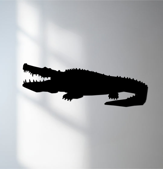 Striking color contrast showcases the crocodile silhouette in this decoration wall art, a fierce reptile metal piece with a bold visual impact.