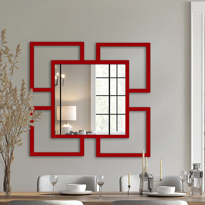 Soft reflections within the Quadra Flow modern mirror capture the gentle lighting, contrasting with the bold red geometric frame, like abstract wall art prints.