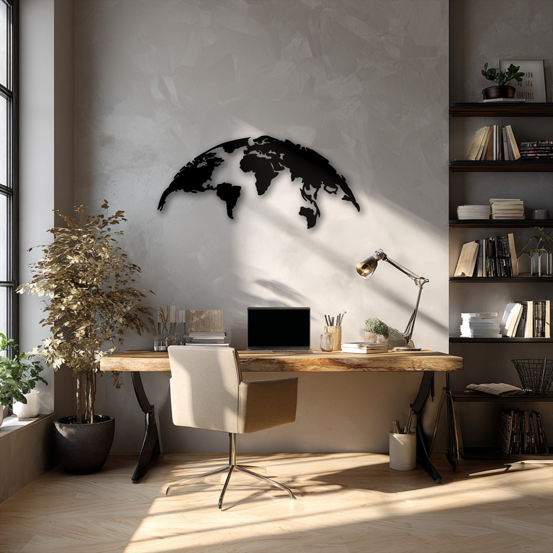 The central subject is a striking black world map metal wall decor, showcasing a modern global silhouette on a textured grey wall.
