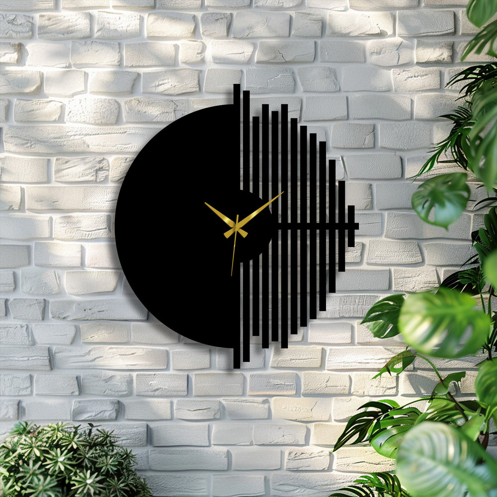 Lit white brick forms the background for a modern metal wall clock, creating a textured backdrop for geometric metal wall decor.
