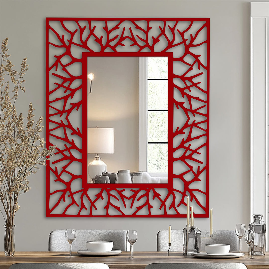 The abstract quality of the branch texture frame enhances this decorative metal art mirror for wall decor, bringing an artistic and modern touch to the room.