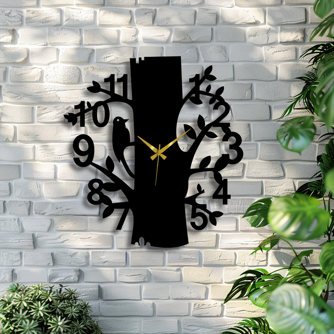 Organic branches and leaves shape this black forest bird metal wall clock, enhancing nature-inspired home decor in its graceful design.