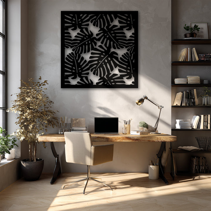 The stillness of a sun-drenched home office is enhanced by the striking Tropical Monstera Leaf Pattern unique metal wall art.