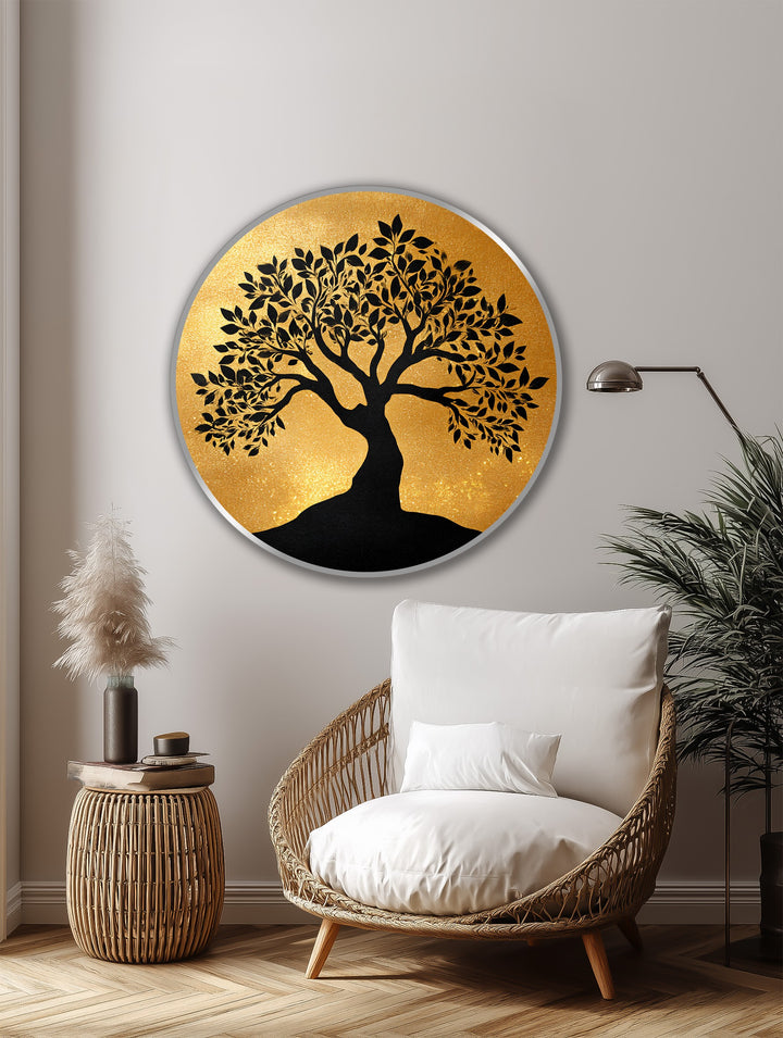 Meticulously showcasing realistic detail, this golden round oil painting home decor depicts a striking black tree silhouette against a lustrous, textured gold backdrop on wood.