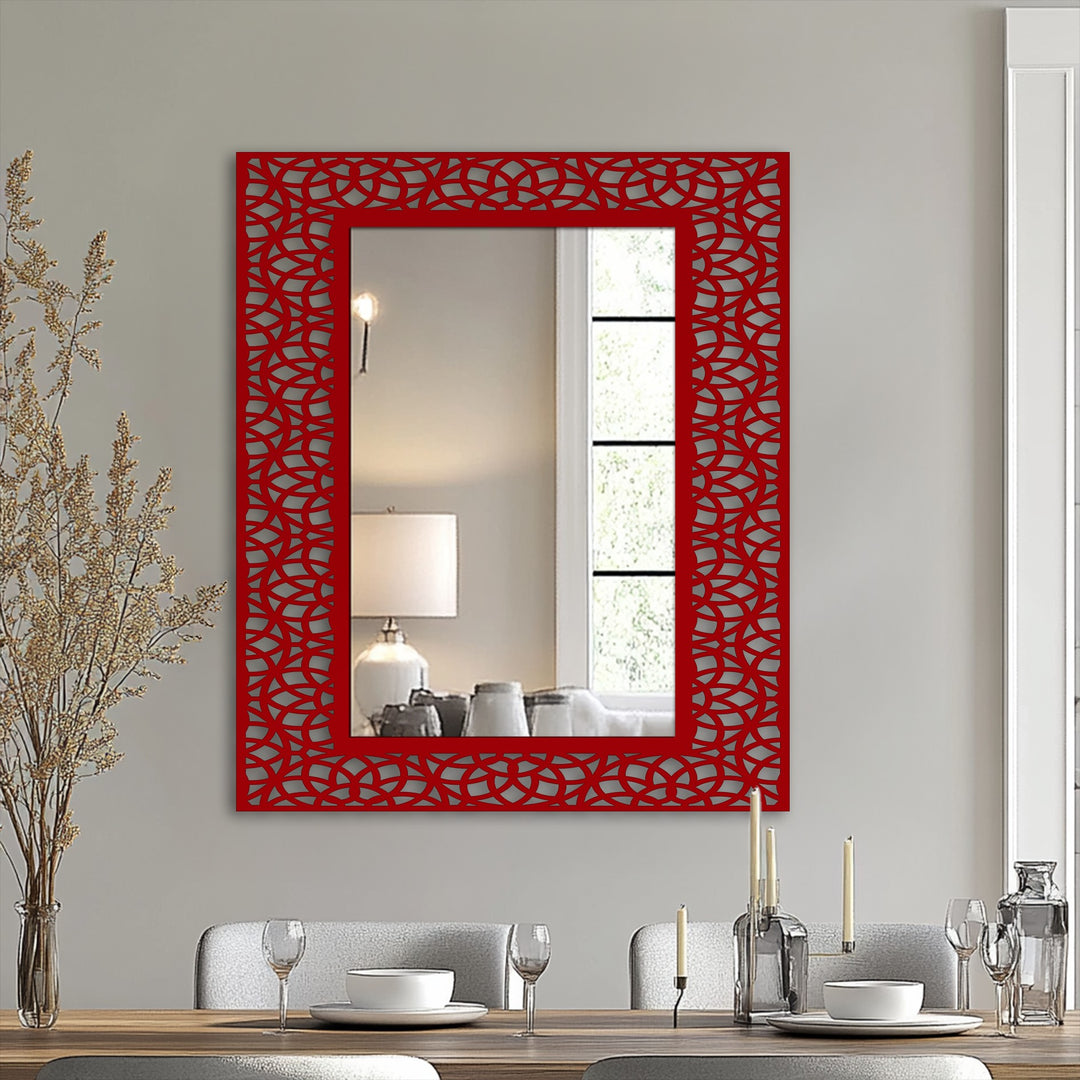 Elegantly reflected in the modern mirror, a serene mood radiates from the dining room setup and interlocking arc pattern metal frame.