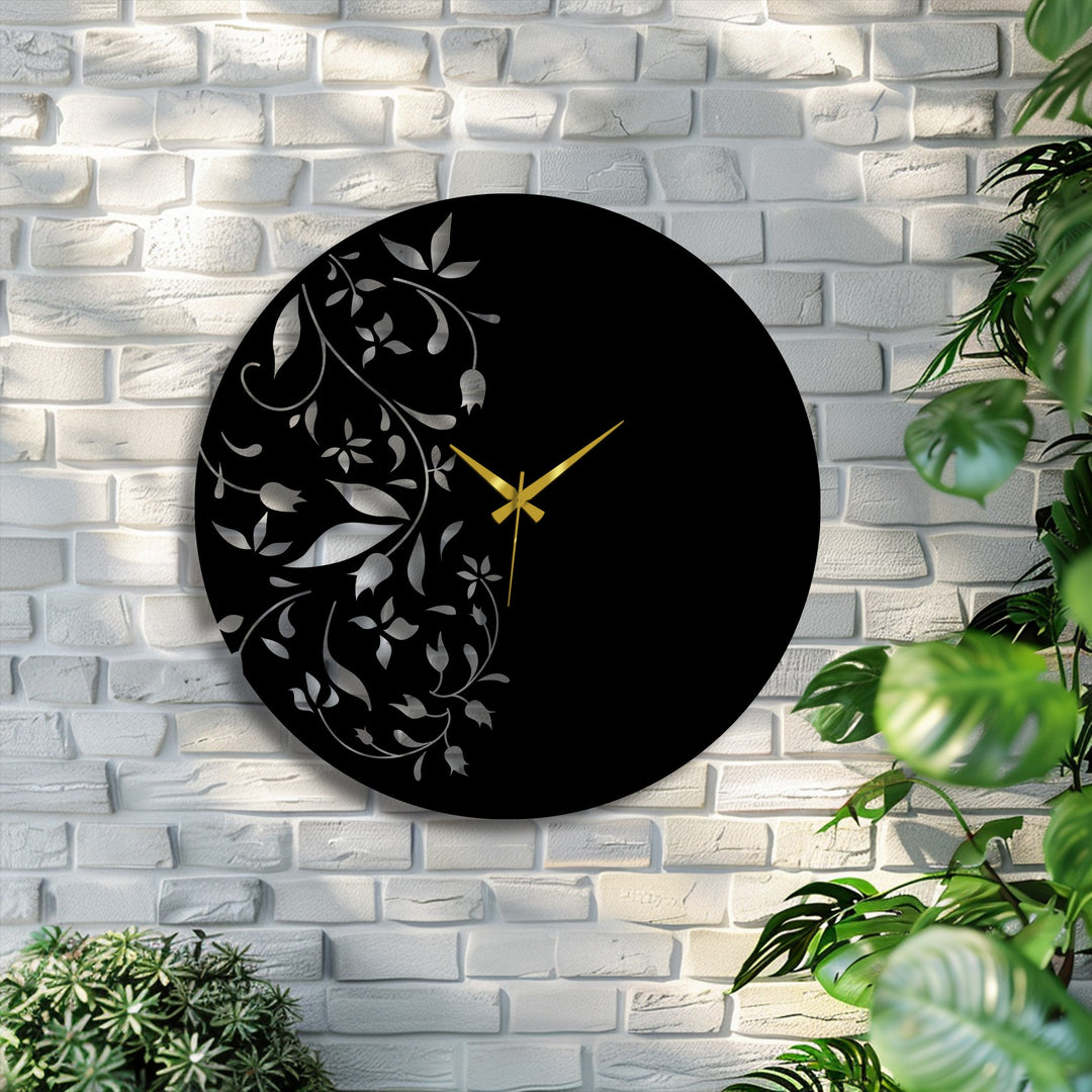 Swirling floral leaves and elegant golden hands create a dynamic sense of movement within this minimal leaf design metal wall clock, a unique decoration wall art.