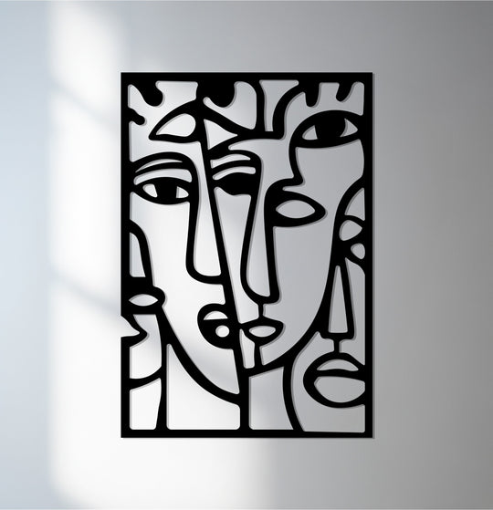Illuminating the modern minimalist line art, the interplay of light and shadow enhances the depth of this abstract faces metal wall decor.