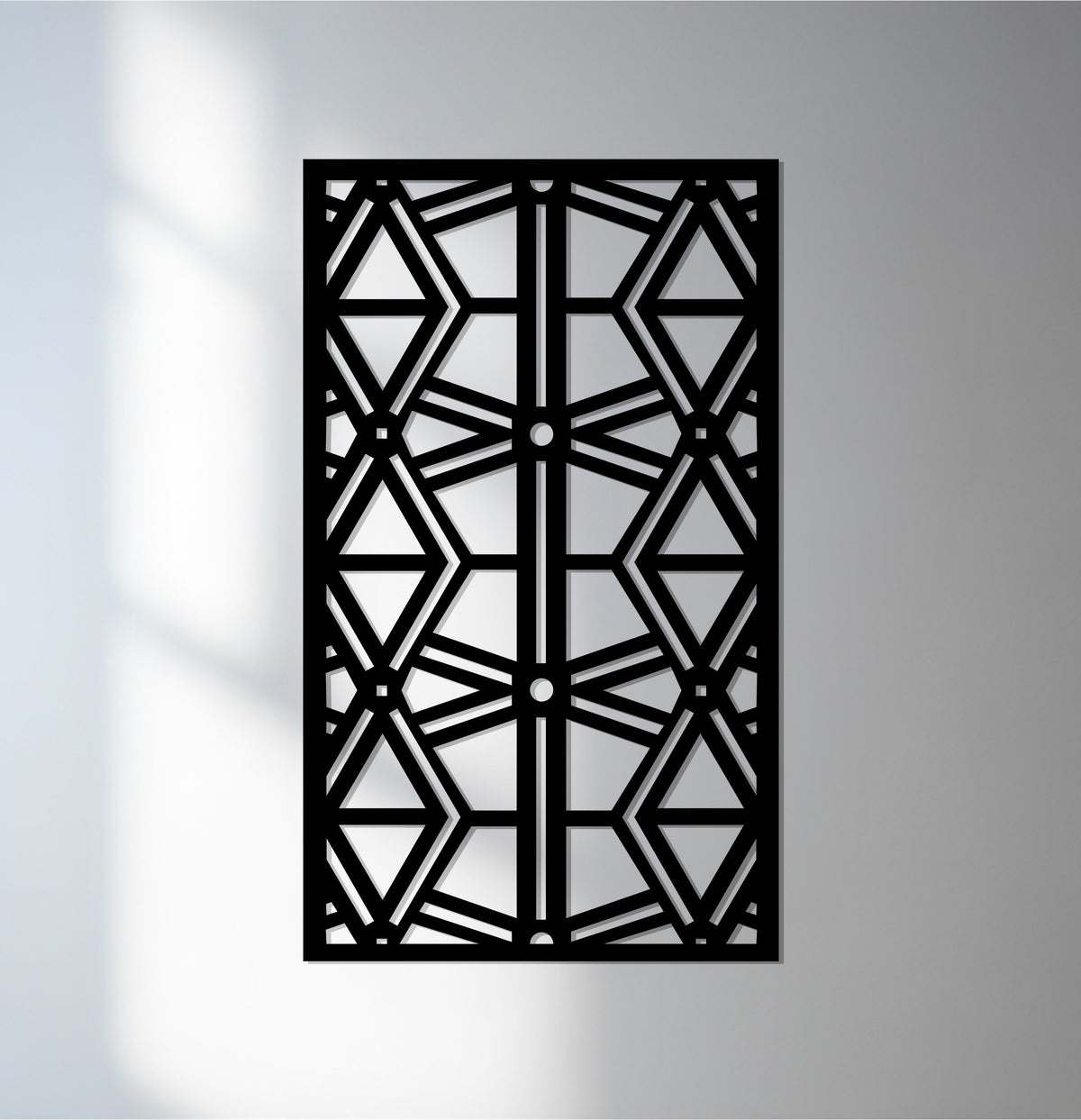 The geometric design of this unique metal wall art is defined by its sharply contrasting edge and precisely laser-cut borders.