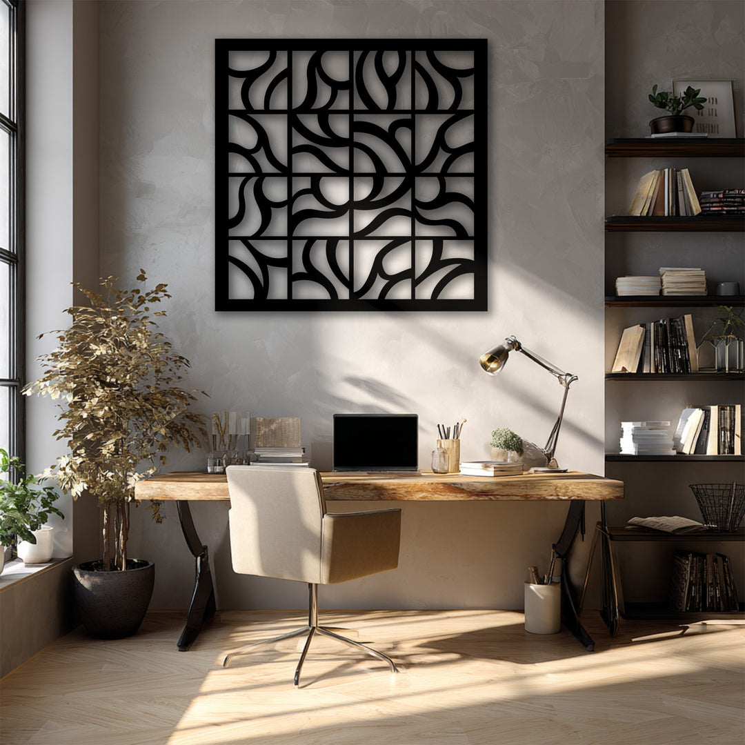 Against warm beige walls, a striking black geometric abstract decorative metal art piece enhances the modern office's neutral tones.