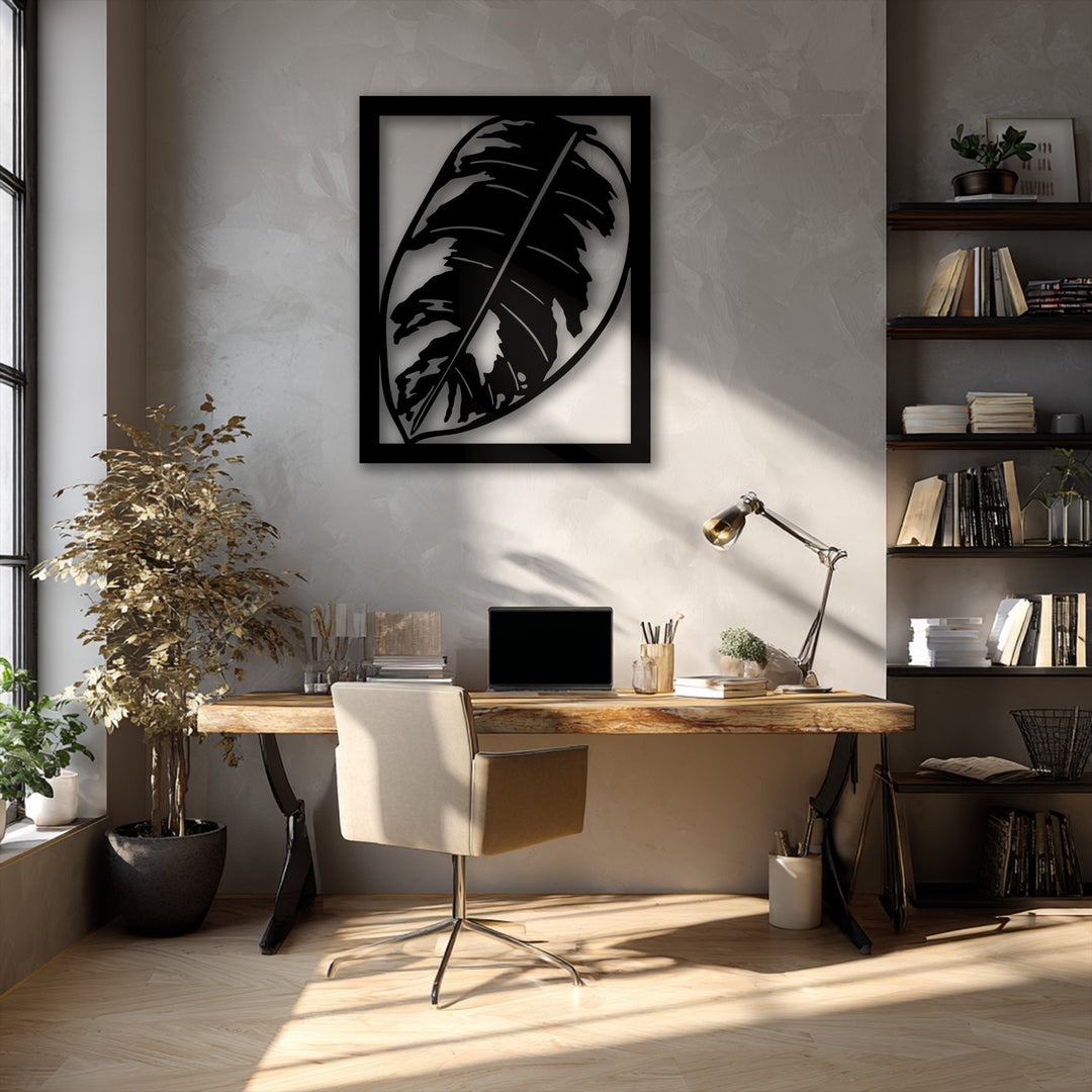 The light wooden floor with sunlit streaks in the foreground highlights the modern interior featuring a striking tropical monstera leaf metal decoration wall art.