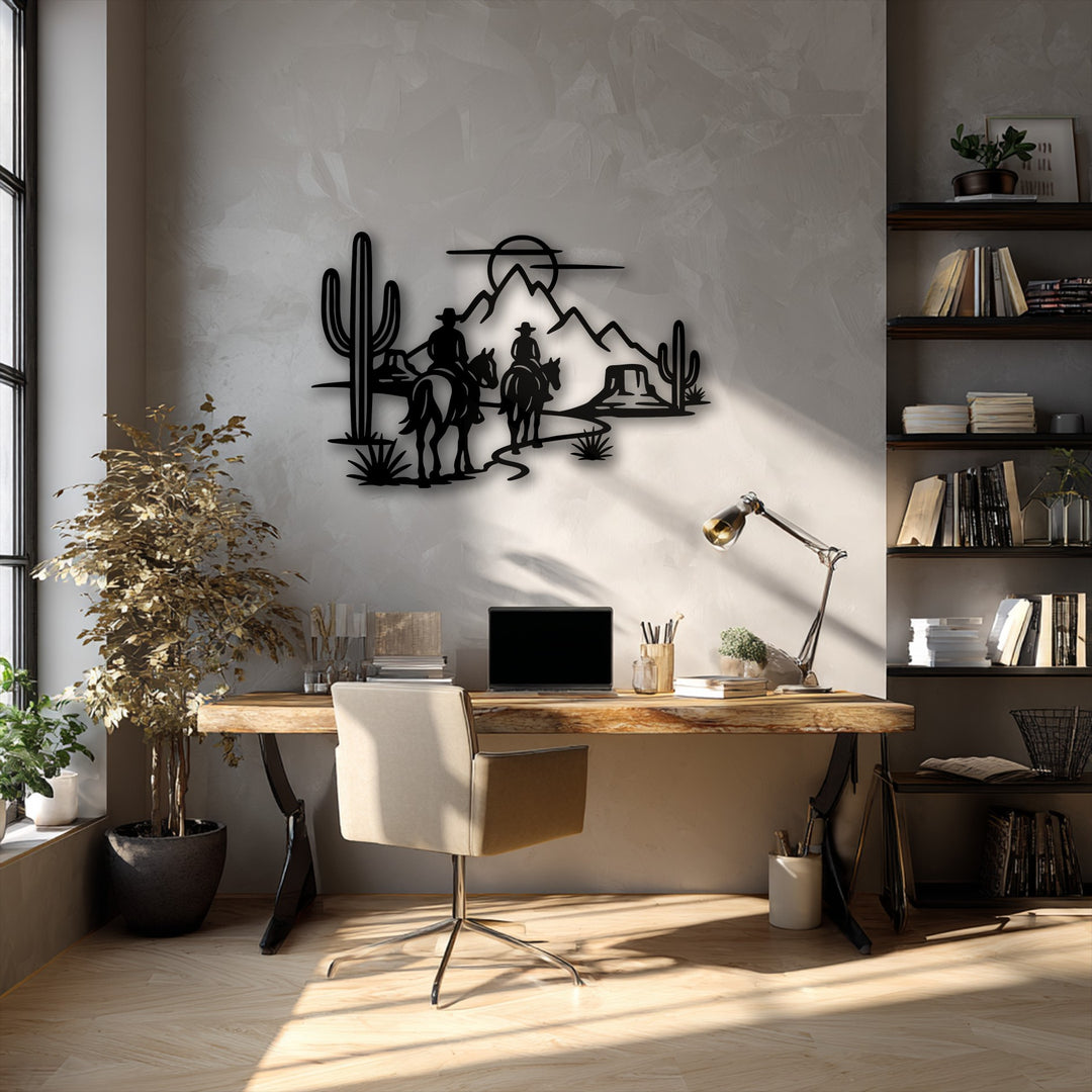 The matte black finish of this striking desert cowboys silhouette metal wall decor enhances its rustic western design.