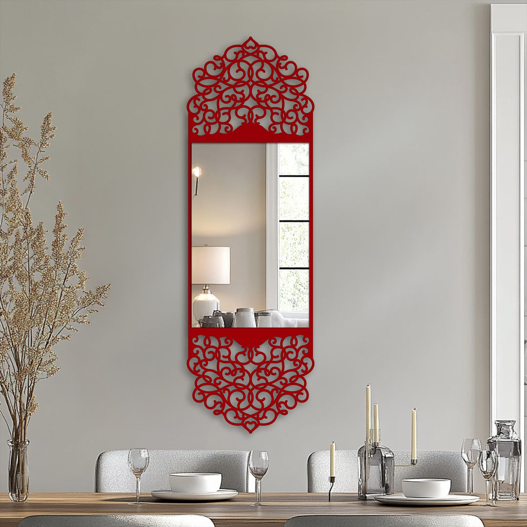 Transitioning from the reflecting glass to the red arabesque frame, this modern mirror presents unique metal wall art with an ornate arch design.