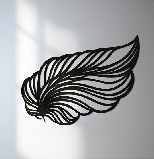 Desaturated blacks define the elegant wing feather **metal art for wall**, creating a modern décor piece that embodies minimalist color saturation.