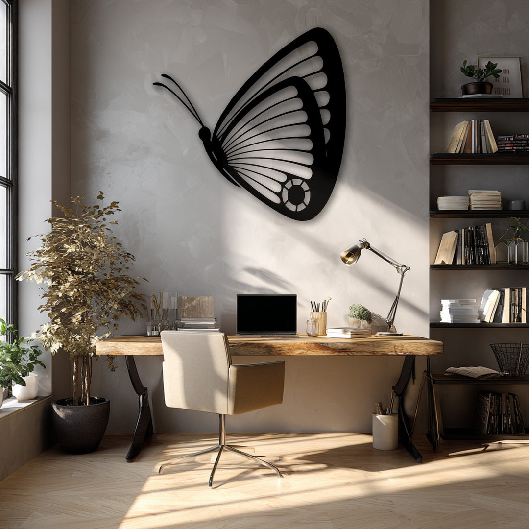 The serene and inviting mood of a sunlit home office is beautifully enhanced by the unique metal wall art butterfly.