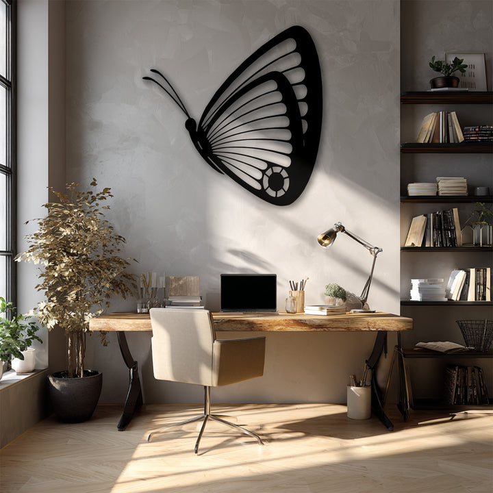 The serene and inviting mood of a sunlit home office is beautifully enhanced by the unique metal wall art butterfly.