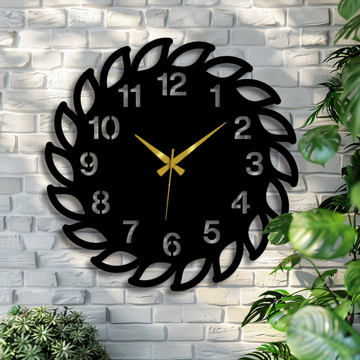 Vibrant color saturation brings the modern nature-inspired decorative leaf frame metal art for wall clock to life against a textured white brick backdrop.