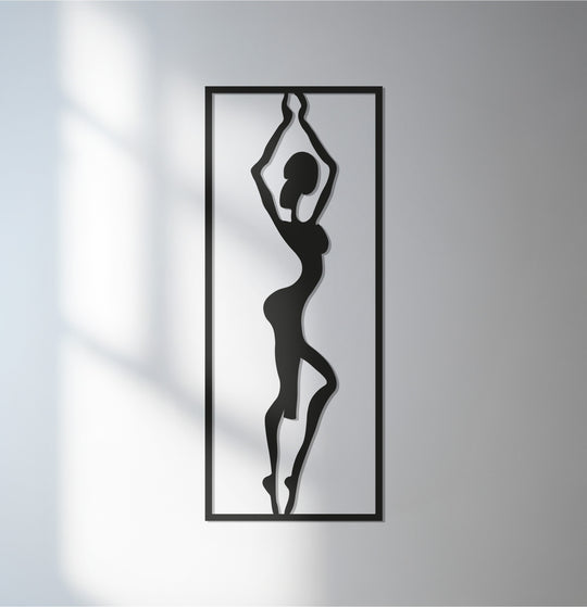 Muted color saturation enhances the decorative metal art, showcasing an elegant black African tribal woman silhouette wall art.