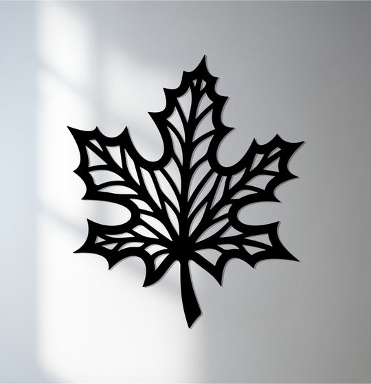 Meticulously crafted metal artwork shows the intricate design of the maple leaf metal wall art, reflecting a nature-inspired motif.