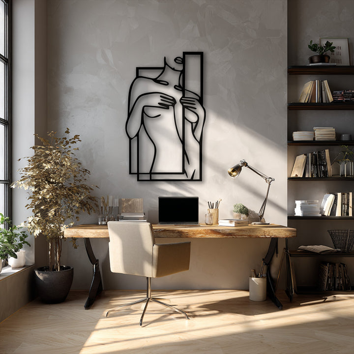 The focal point is a striking black minimalist female figure line art with a geometric frame, embodying unique metal wall art decor.