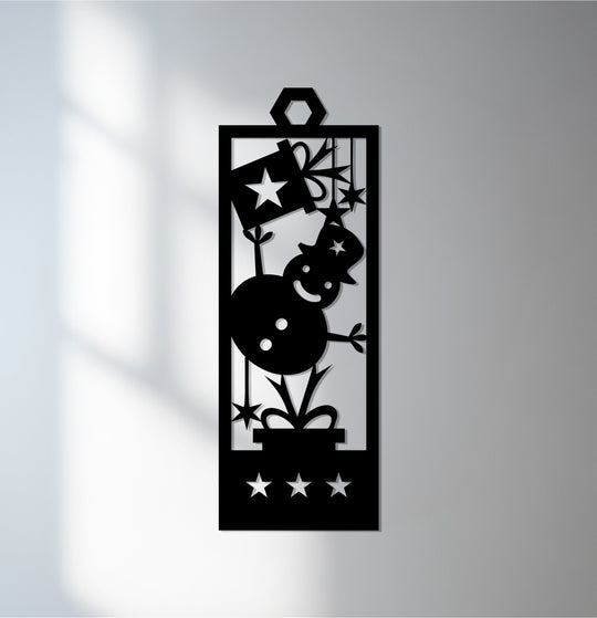The brightest area illuminates the intricate details of the joyful snowman Christmas stars metal art for wall, casting shadows that enhance its festive design.