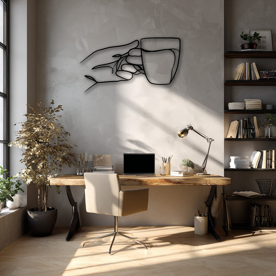A horizontal, abstract minimalist hand holding a cup, crafted as a sleek metal wall decor piece, casts a dramatic shadow.