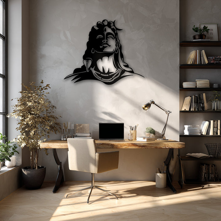 The precisely cut edges and distinct borders of the striking Lord Shiva metal artwork cast subtle shadows on the wall.