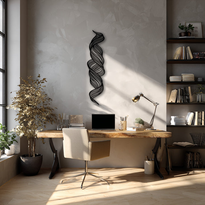 The sleek matte black finish of the abstract twisted metal art for wall emphasizes its flowing, modern design.