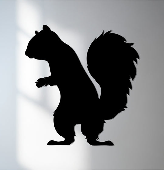 Suggesting an appealing abstract quality, the squirrel silhouette metal art for wall captures the woodland animal in a minimalist, decorative design.