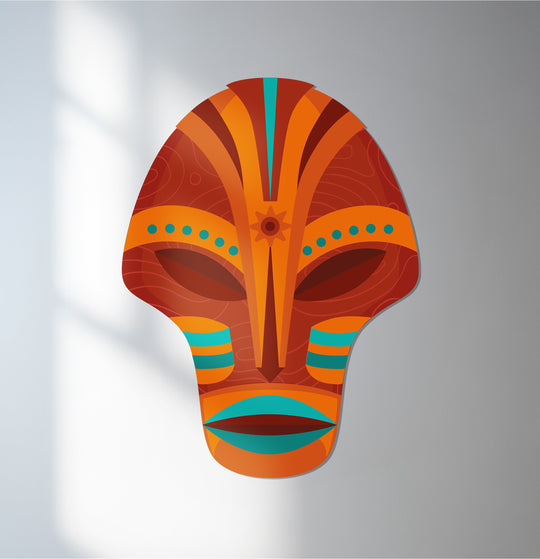 Subtle light and shadow accentuate the tribal-inspired metal wall art with its decorative mask design, creating a captivating decoration wall art piece.