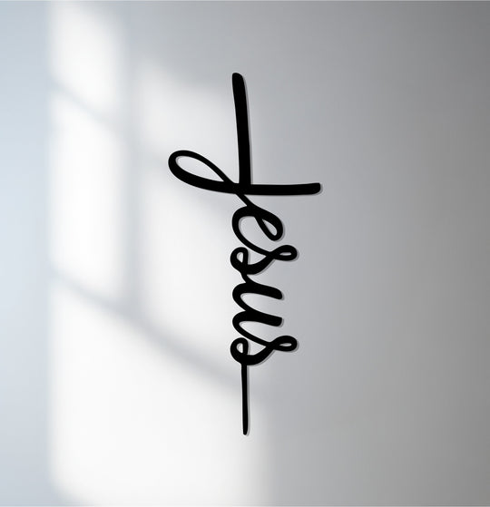 Black is the dominant color in this modern decoration wall art featuring a minimalist Jesus cross metal wall art for Christian faith-inspired decor.