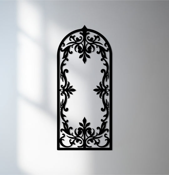 The focal point of this regal arch showcases the intricate details of this black ornamental metal artwork for any space.