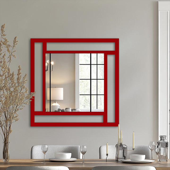 With the red-framed geometric square mirror creating a sense of depth, the dynamic asymmetry gives the illusion of movement in this modern framed wall mirror.