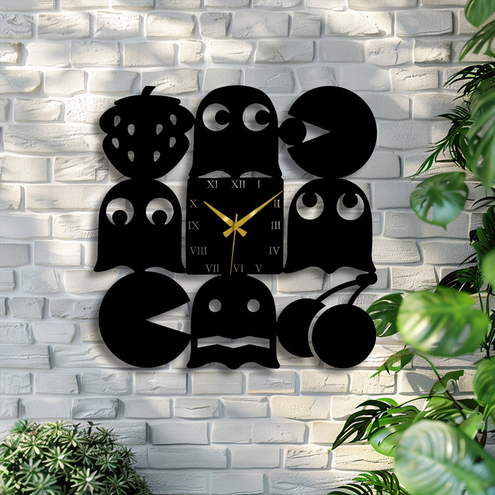 With intense color saturation, this unique metal wall art, a deep black retro arcade clock, contrasts the white brick and green plants.