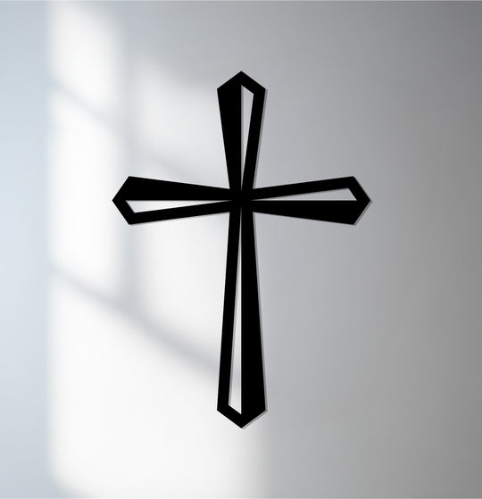 Black dominates this minimalist silver cross, enhancing the metal wall decor's design, while creating a visually striking religious art piece.