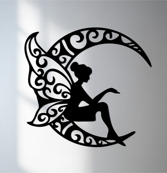 Elaborate borders give this metal wall art a unique metal wall art aesthetic, framing the silhouette of a fairy perched gracefully on a crescent moon's edge.