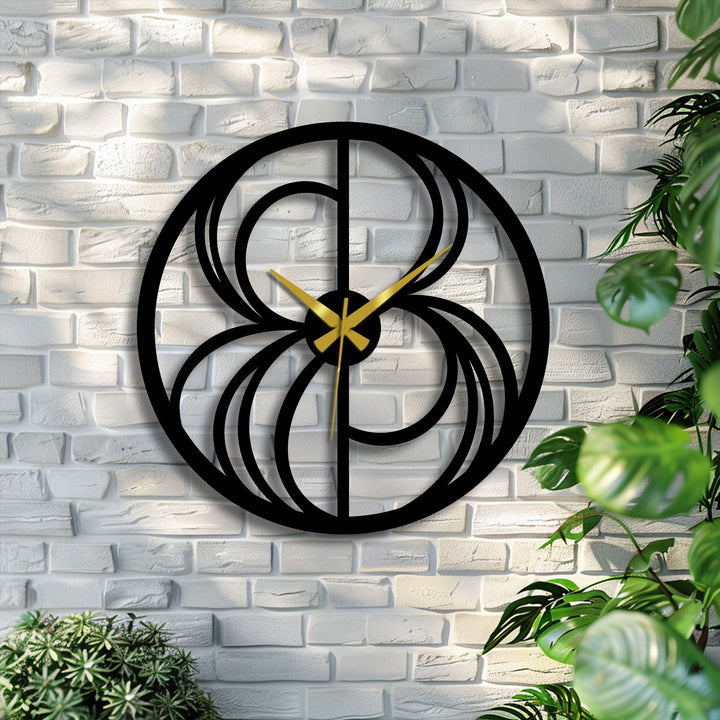 Black dominates this abstract swirl metal wall clock, a captivating decorative metal art piece with geometric designs and elegant gold hands, perfect for modern decor.
