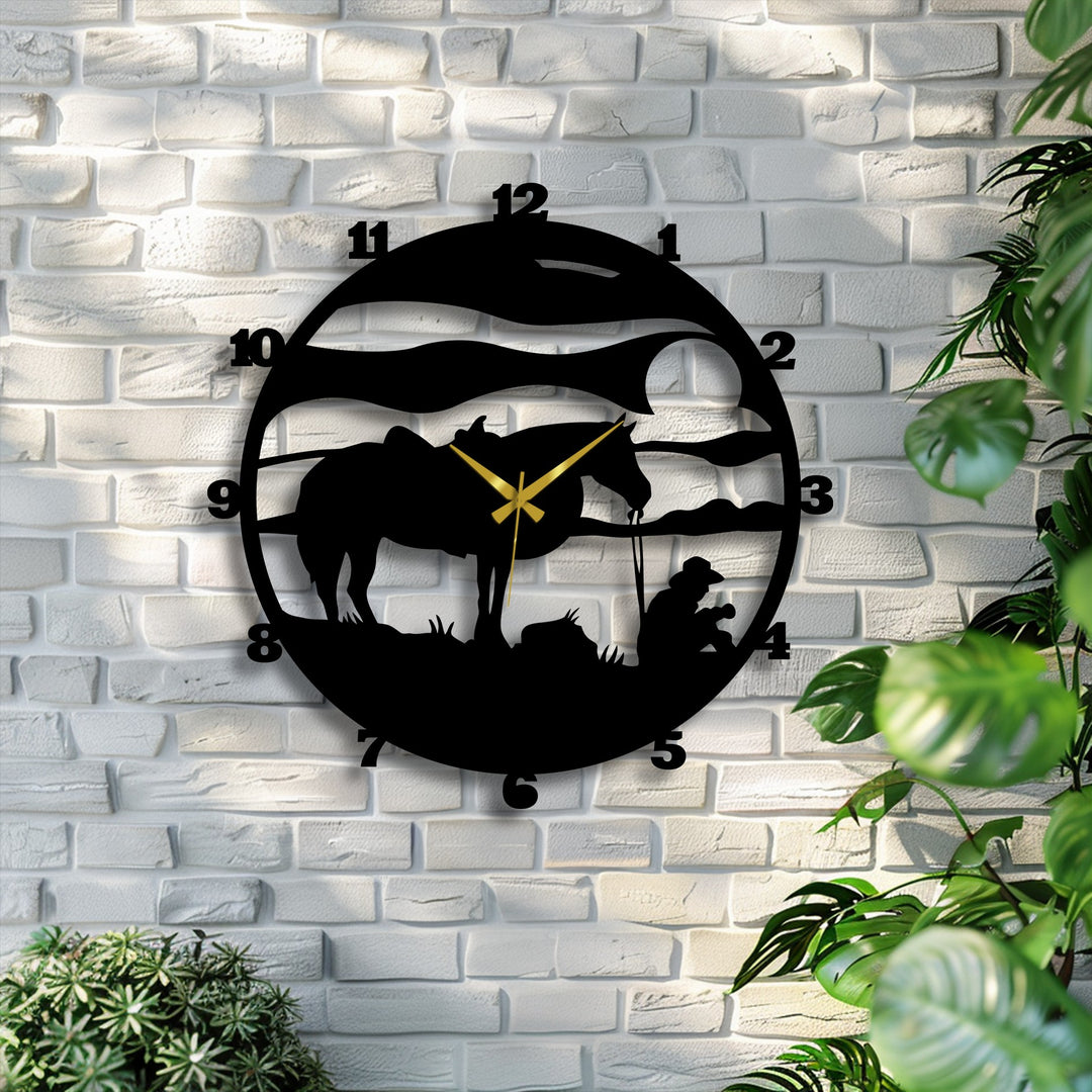 Subdued color saturation showcases a Western Cowboy Horse Silhouette metal art for wall clock, revealing a rustic ranch scene against a textured backdrop.