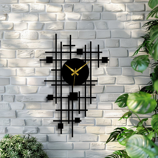 Featuring strong color contrast, the black abstract grid metal wall clock has a striking visual impact against the bright white brick, illustrating a modern metal art for wall display.