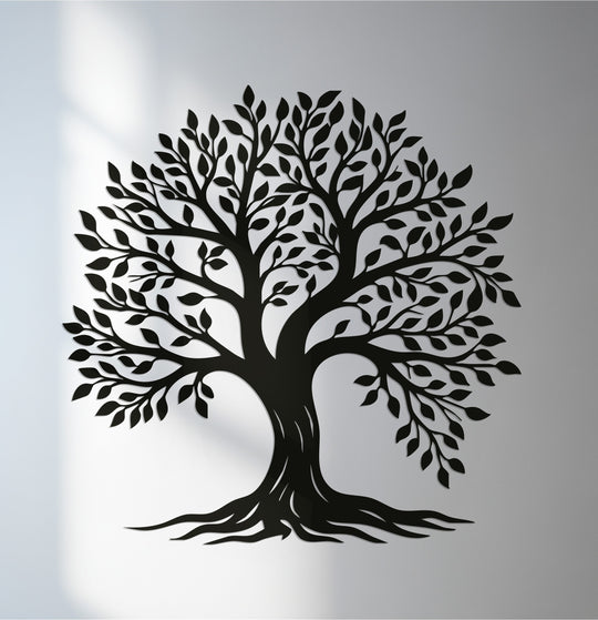 Visual rhythm is achieved in this tree of life design through the balanced arrangement of branches and leaves in this elegant metal artwork.
