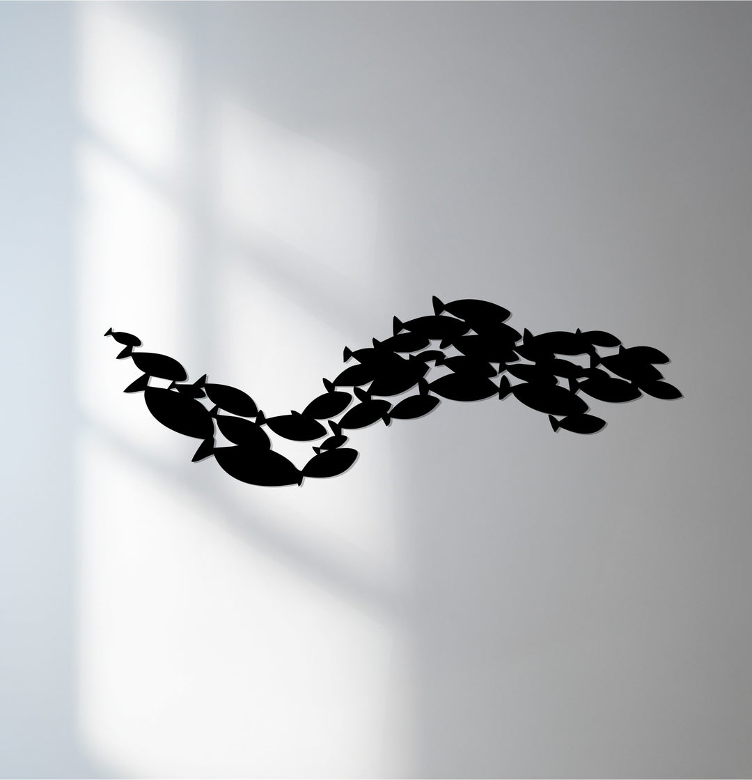 School of fish metal wall art for coastal homes