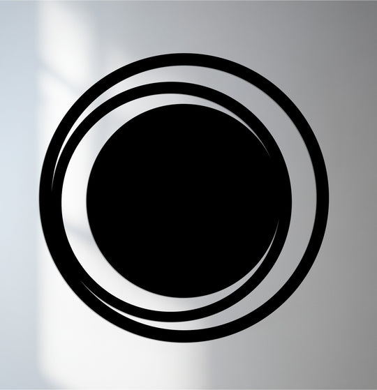 Highlighting the abstract quality, concentric metal art for wall forms an intriguing geometric design with bold circles, creating a modern statement.