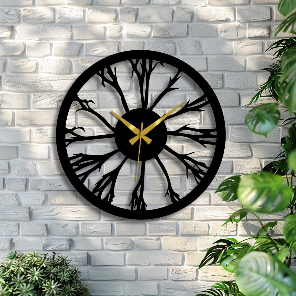 Sunlight casts striking light and shadow patterns around the tree silhouette nature metal wall clock, a unique metal wall art piece on a textured brick wall.