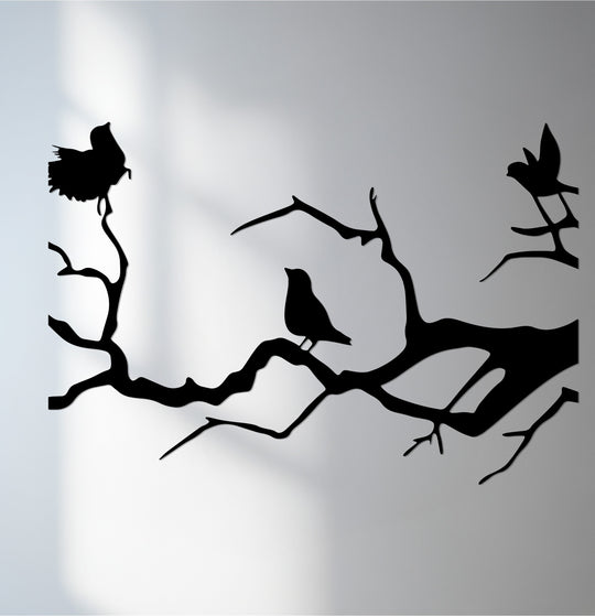 Smooth surface texture showcases the intricate details of this birds on branch metal wall decor, casting delicate shadows that enhance the silhouette art.