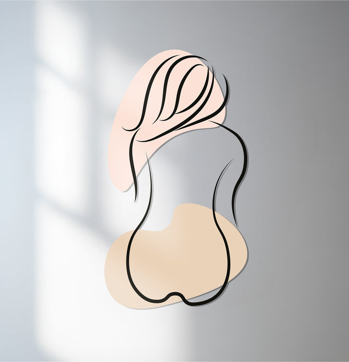 Minimalist female silhouette metal wall art in neutral tones