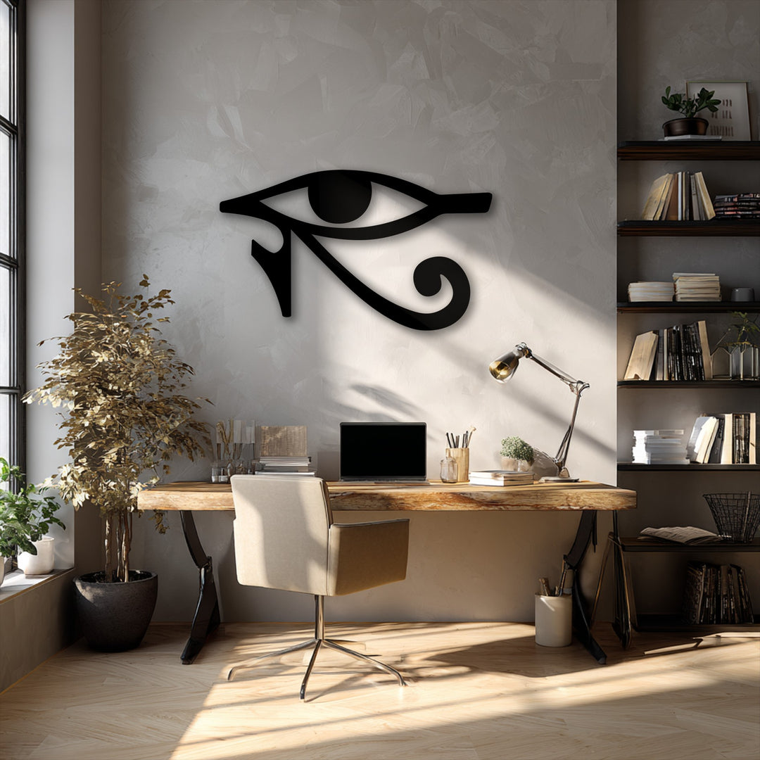 Defined geometric shapes of the Eye of Horus, a captivating metal art for wall, accentuate the textured backdrop in this sunlit workspace.