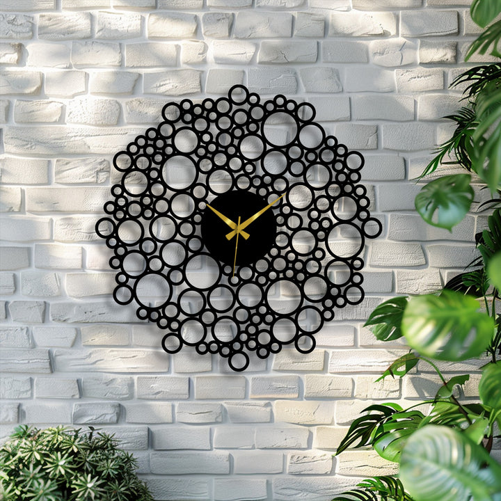 An inviting mood radiates from this modern geometric design, a bubble mesh metal wall clock that serves as exceptional metal art for wall, adding a unique touch.