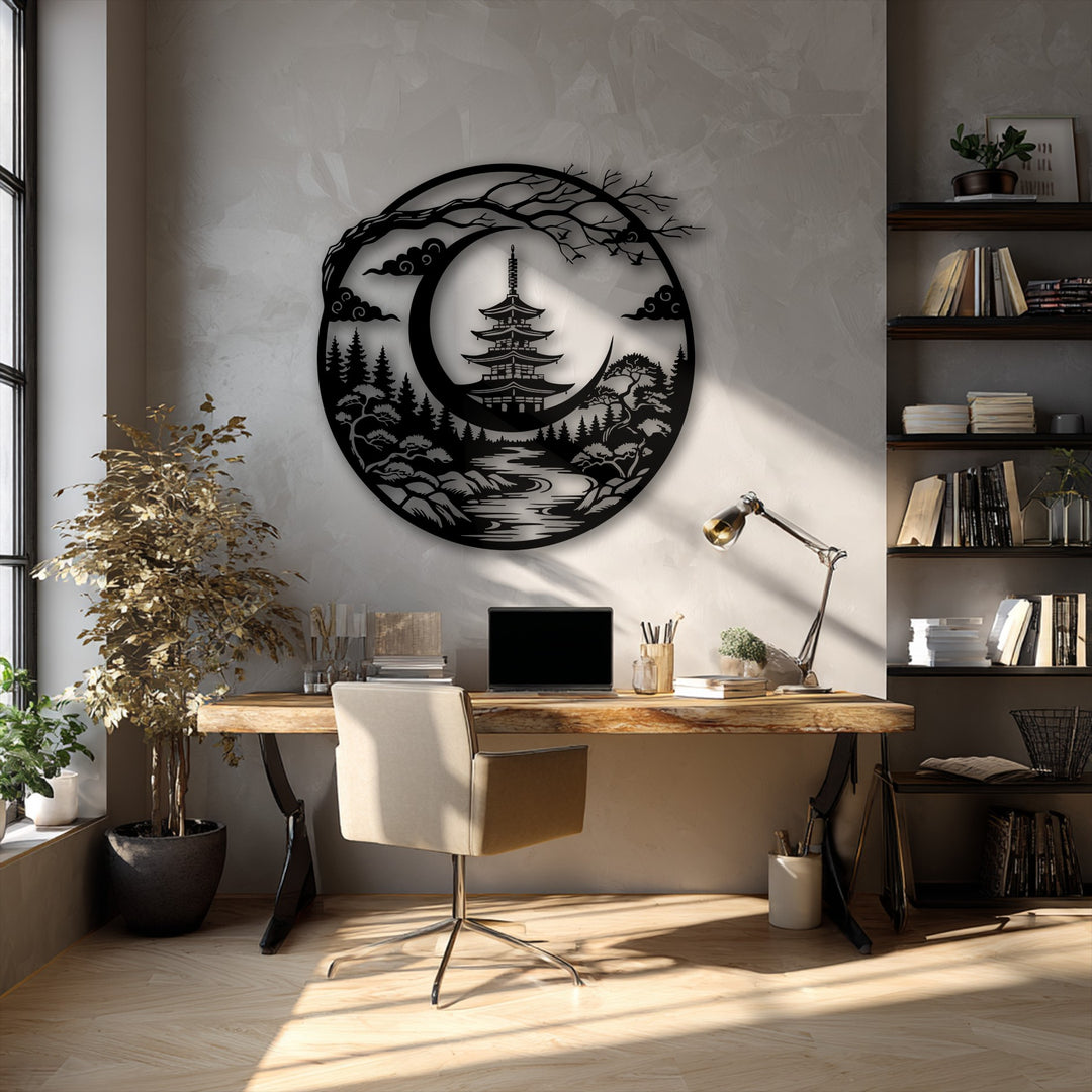 The striking edge of this decorative metal art piece sharply defines the Japanese pagoda and crescent moon landscape, framing the serene design.